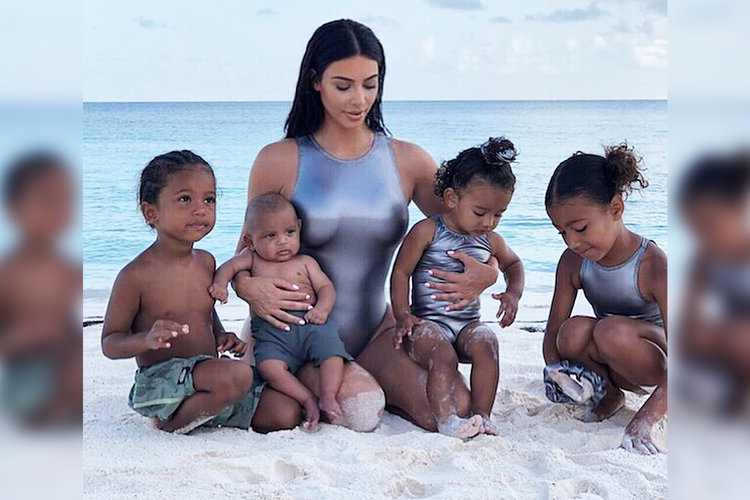 Kim Kardashian Jumps Into The Blue Lagoon With Her Kids